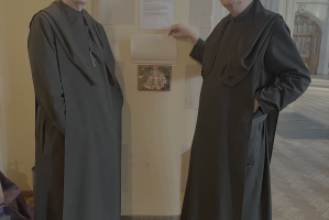 Abbot Dominic Taylor and Safeguarding lead, Fr Timothy Gorham with the plaque.