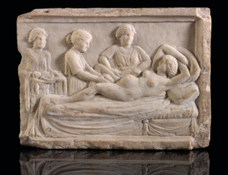 Carved marble plaque depicting a birthing scene,  Excavated in Ostia, Italy,  400 - 300 BC.  © Welcome Collection, London