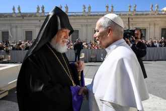 Pope Leo XIV greets Armenian Catholicos Aram I at the beginning of the General Audience