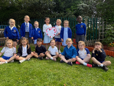 St Mary's pupils with their special message for Elmtree Care Home residents