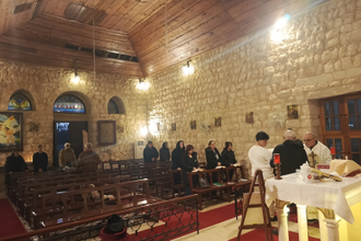 Fr Youssef Semaan during Mass in Kfour, which has seen the Christian community plummet © ACN