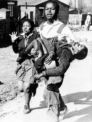 Mbuyisa Makhubu carries Hector Pieterson after he was shot and killed at the Soweto Uprising. Wiki Image