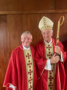 Fr Jim Duffy with Cardinal Vincent Nichols. Image: Eddie Tulasiewicz