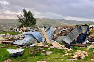 Homes completely destroyed by settlers