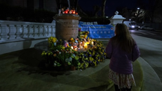 Prayers, floral tributes and candles at statue of Ukrainian Saint Volodymyr, Holland Park
