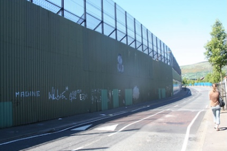 'Peace wall' along Cupar Way, Belfast 22/05/10. Duke Human Rights Center. Wiki Image