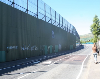 'Peace wall' along Cupar Way, Belfast 22/05/10. Duke Human Rights Center. Wiki Image