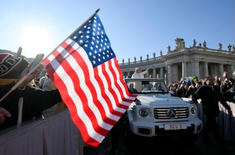 US flag waves as Pope Leo XIV greets crowds in St Peter's Square  @Vatican Media