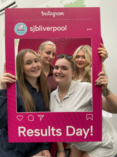 Students celebrating at St John Bosco Arts College, Croxteth