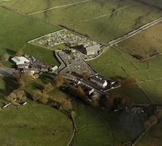 Mayo Abbey ruin with new church