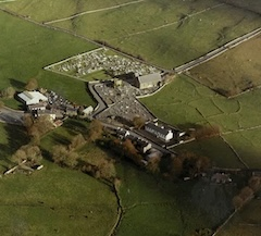 Mayo Abbey ruin with new church