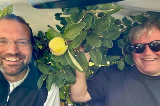 Br Ambrose and visiting priest collecting plants