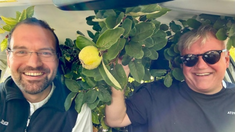 Br Ambrose and visiting priest collecting plants