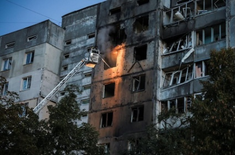 Firefighters at block of flats hit by Russian drone recently. . Image:  Vatican Media