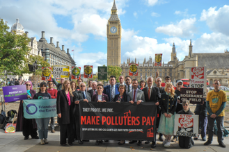 Campaigners and MPs with their message outside Parliament - Image by Quakers in Britain