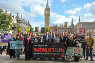 Campaigners and MPs with their message outside Parliament - Image by Quakers in Britain