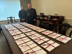 Bishop Deenihan, with the sealed official records for the Cause for Canonisation of Fr Willie Doyle SJ and Fr John Hogan ocds, today at the enquiry.