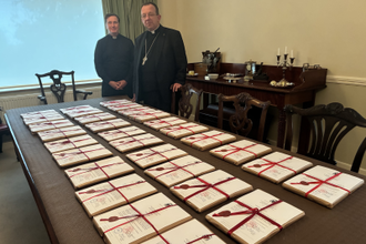 Bishop Deenihan, with the sealed official records for the Cause for Canonisation of Fr Willie Doyle SJ and Fr John Hogan ocds, today at the enquiry.