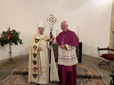 Archbishop Cherry Vann with Archbishop Mark O'Toole and the Coronation Cross