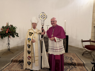 Archbishop Cherry Vann with  Archbishop Mark O'Toole and  the Coronation Cross