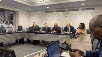 Eugene Quinn speaks at UNHCR event