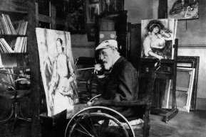 Photo of  Renoir in his wheelchair,  On the easel, portrait of Mrs Tilla Durieux.  In the background, portrait of Mrs Colonna 1914