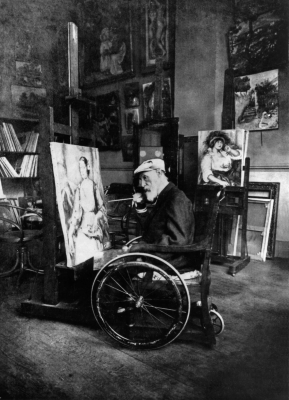 Photo of Renoir in his wheelchair, On the easel, portrait of Mrs Tilla Durieux. In the background, portrait of Mrs Colonna 1914