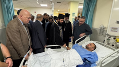 Delegation at bedside of man injured in church shooting © Greek Orthodox Archdiocese of Jordan